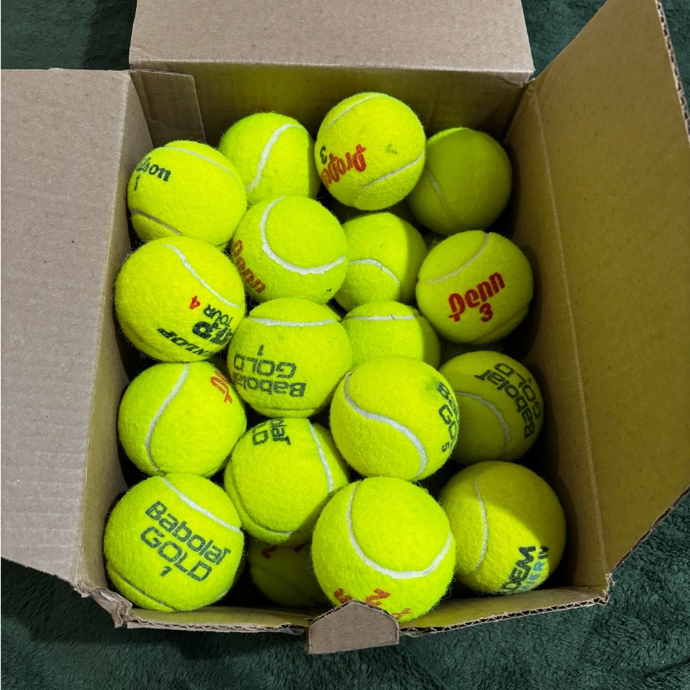 Lot of 30 used tennis balls - different brands - all in good shape